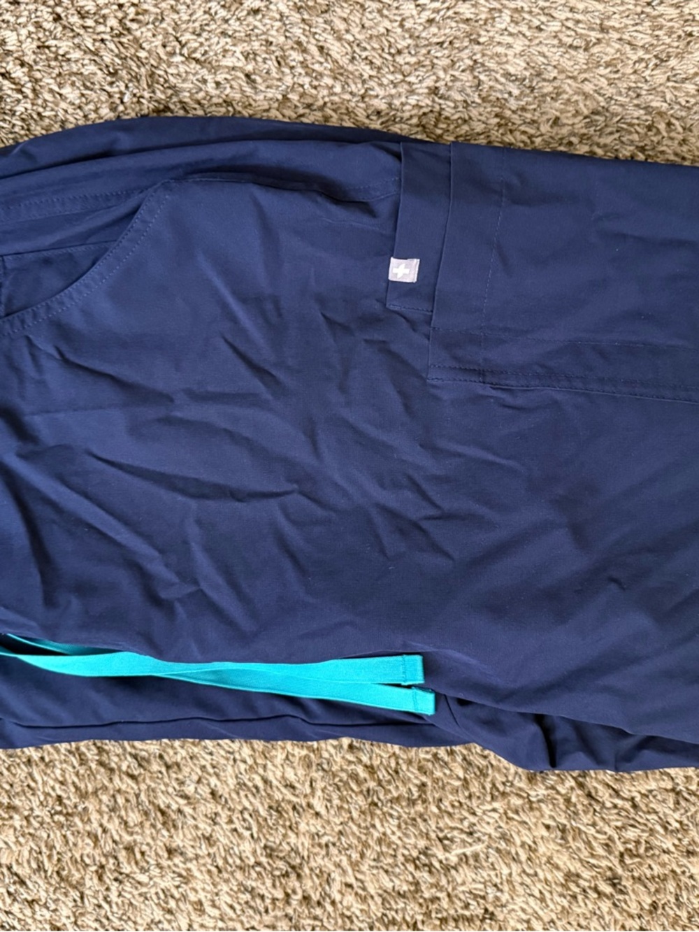 Figs Women's Navy Blue Scrub Top with Teal Drawstring